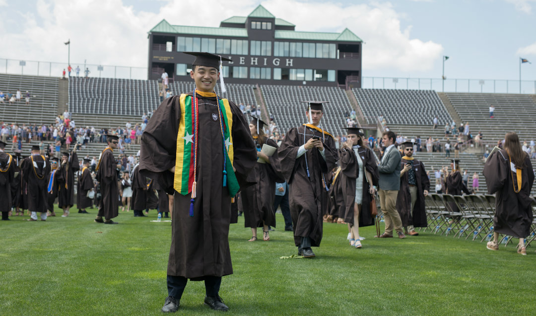 Graduate stands proudly at Lehigh commencement