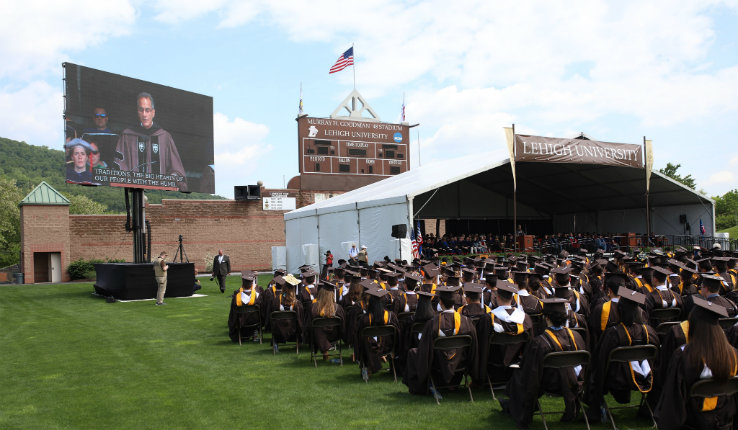 Richard Verma on large screen during Lehigh University commencement address