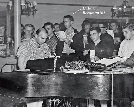 H. Barry Bergman '61 is 'the tall guy' holding music to the right of Bob Cutler in the photo.