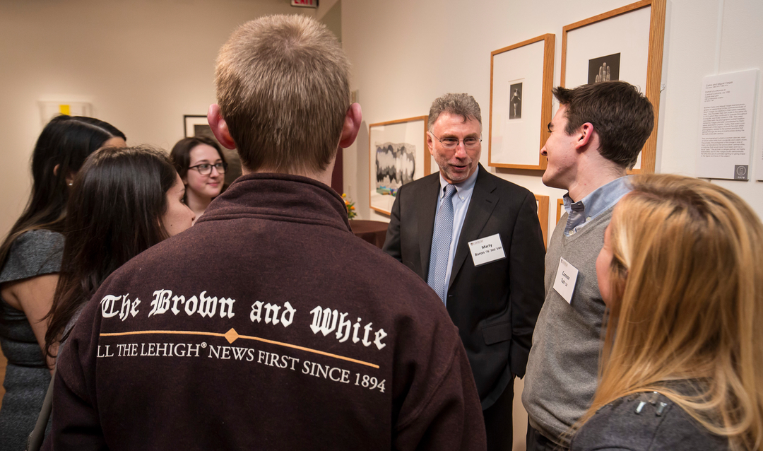 Marty Baron speaking with students on a previous visit to Lehigh