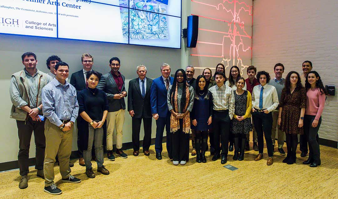 A group of Lehigh University students and professor pose with Charlie Dent