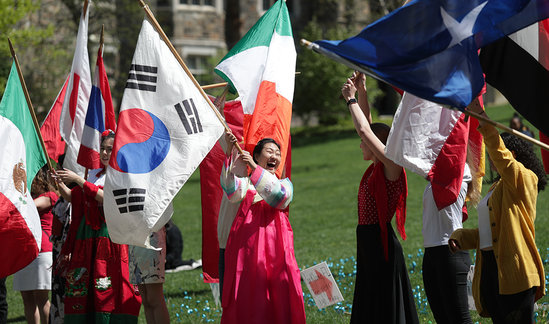 Lehigh students carry their country's flags at the International Bazaar.