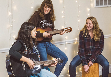 Students playing musical instruments