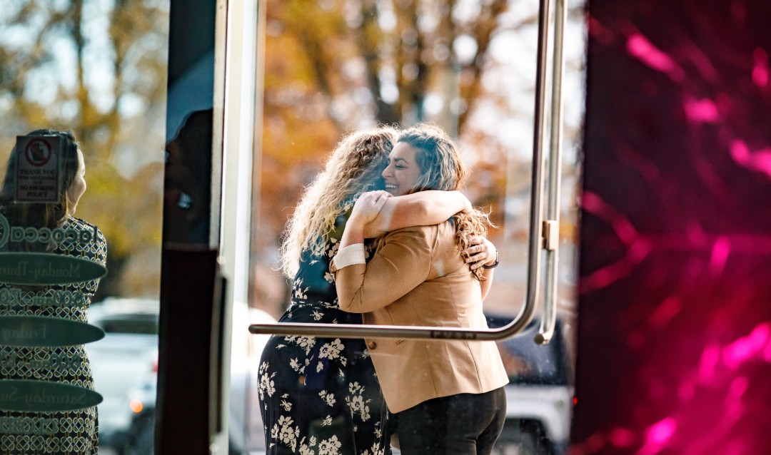 Lehigh University alumnae greet with a hug during Founder's Weekend