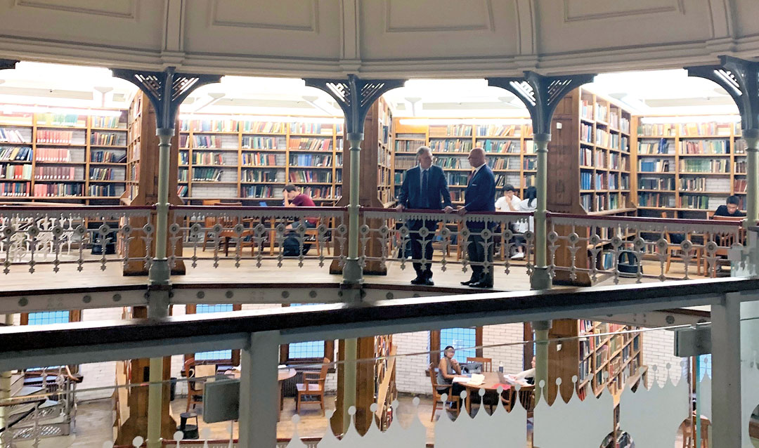 Marty Baron and Michael Smerconish stand in Linderman Library