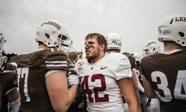 Lehigh offensive lineman Jack Kempsey greeting Lafayette linebacker Major Jordan