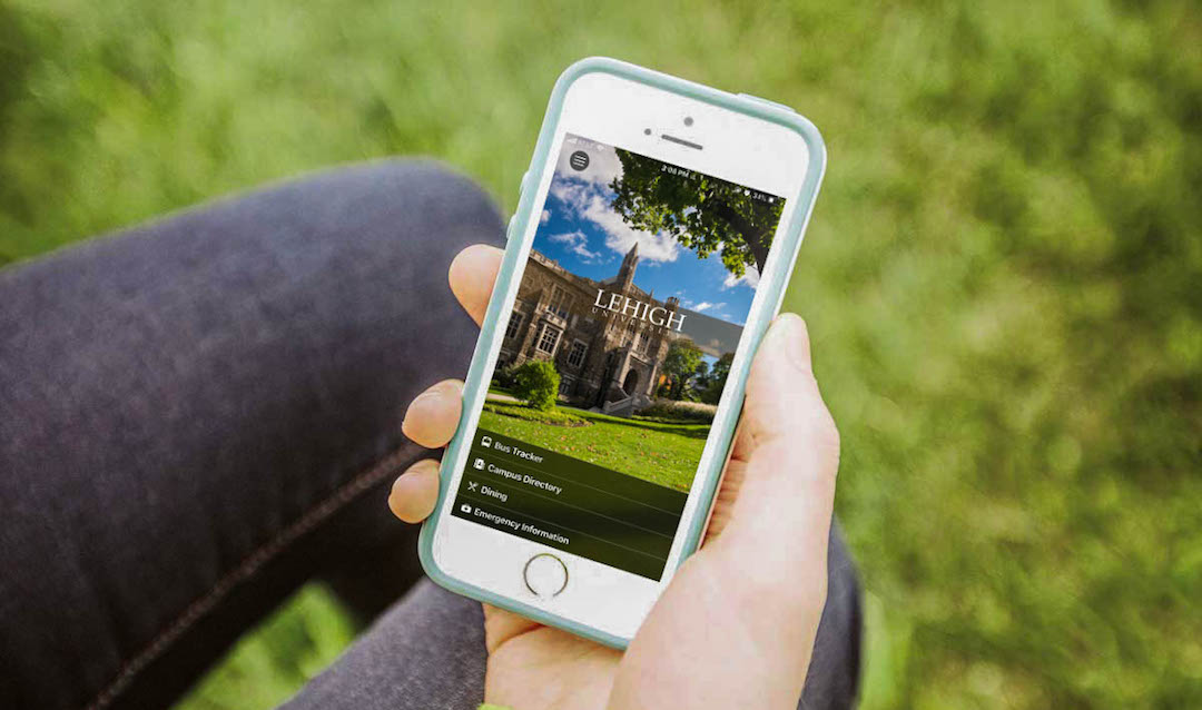 Image of hand holding a smartphone displaying Lehigh University's mobile app