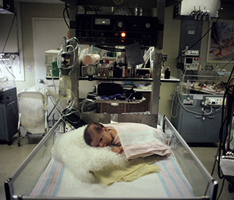 Newborn infant in hospital nursery