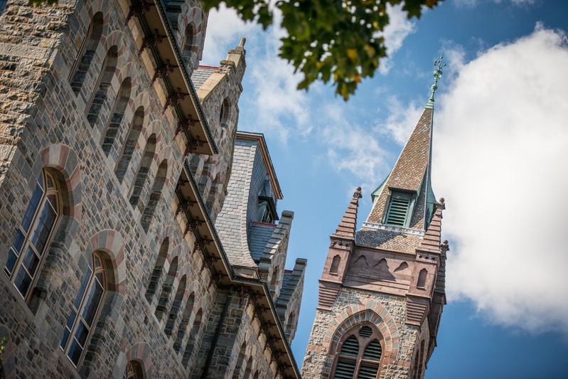 View from below with blue sky in background of Lehigh University's University Center