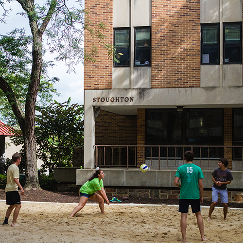 Students playing volleyball