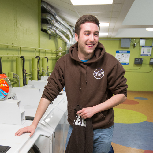 Student in laundry room