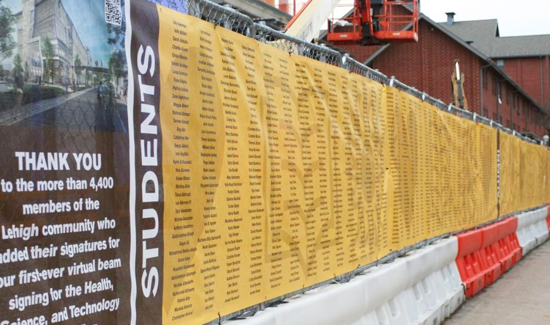 Signatures added to beam for HST building
