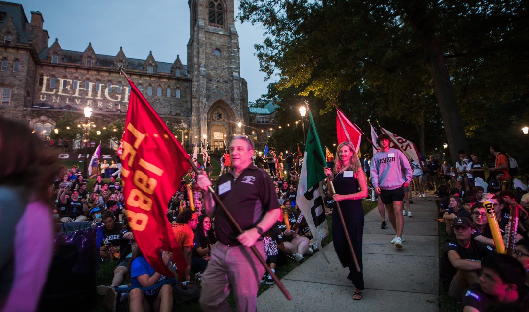 The Rally 2021 with alumni carrying class flags