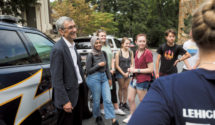 Joseph J. Helble '82 with students