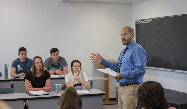 Economics Professor Chad Meyerhoefer with students