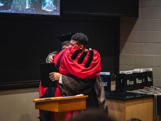 todd watkins embraces a Posse graduate