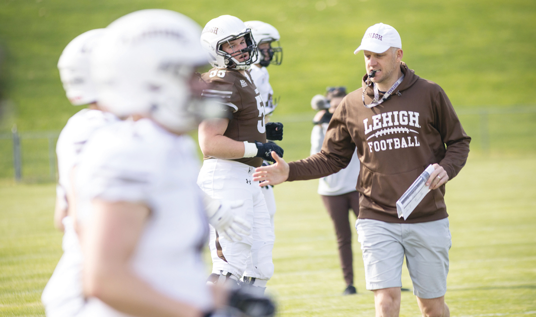 Kevin Cahill interacts with Lehigh players
