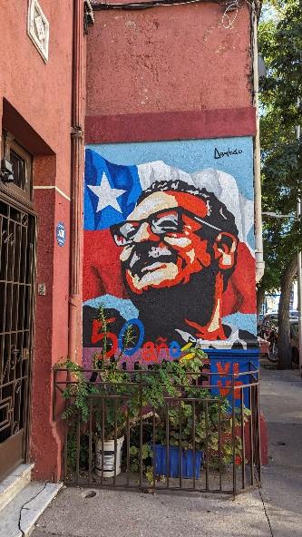 a mural with the face of Salvador Allende in the Yungay neighborhood.
