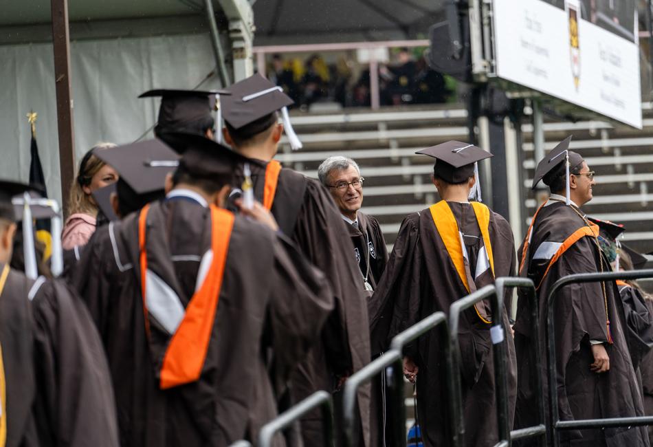 President Helble greets graduates