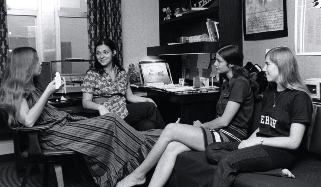 Students share a moment in a Centennial Complex dorm, circa Fall 1971.