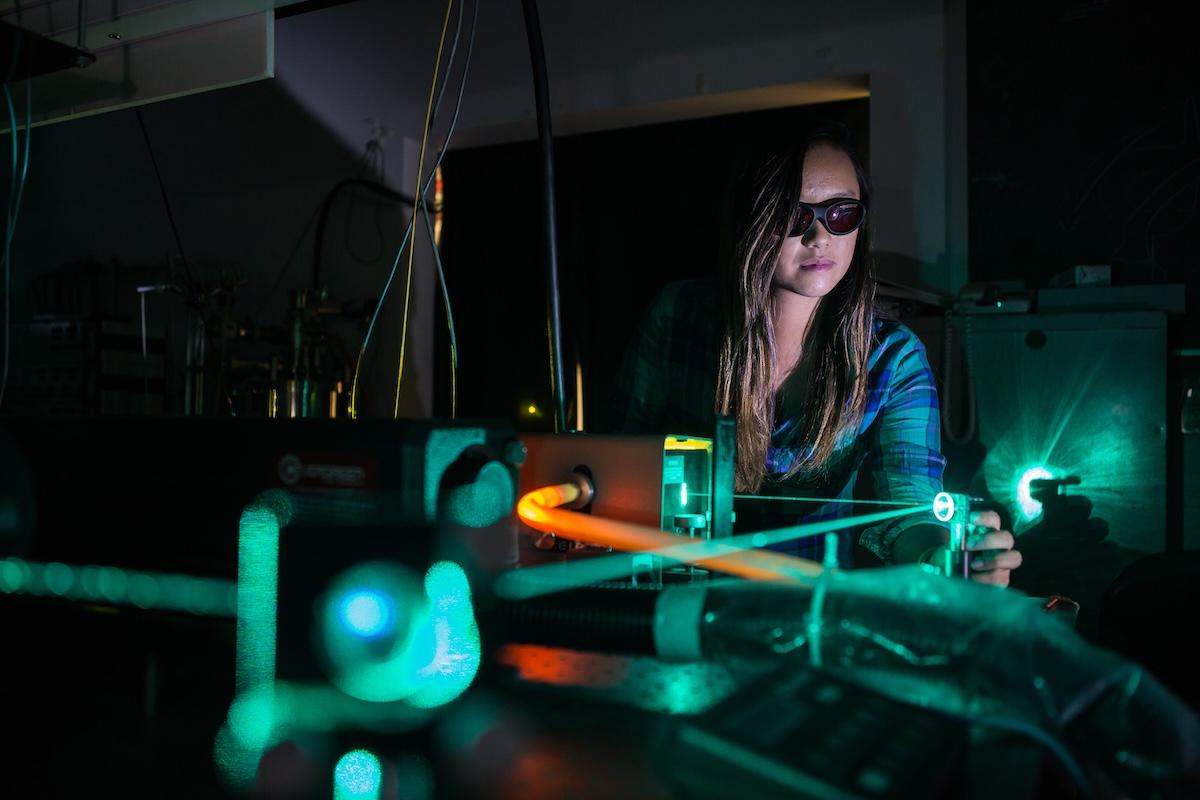 Female student in Laser Lab