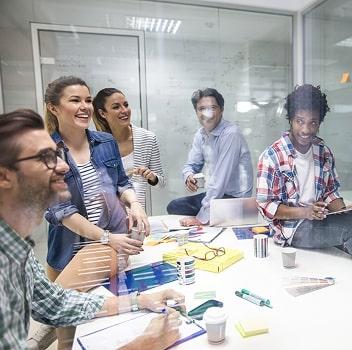 Students working in a conference room