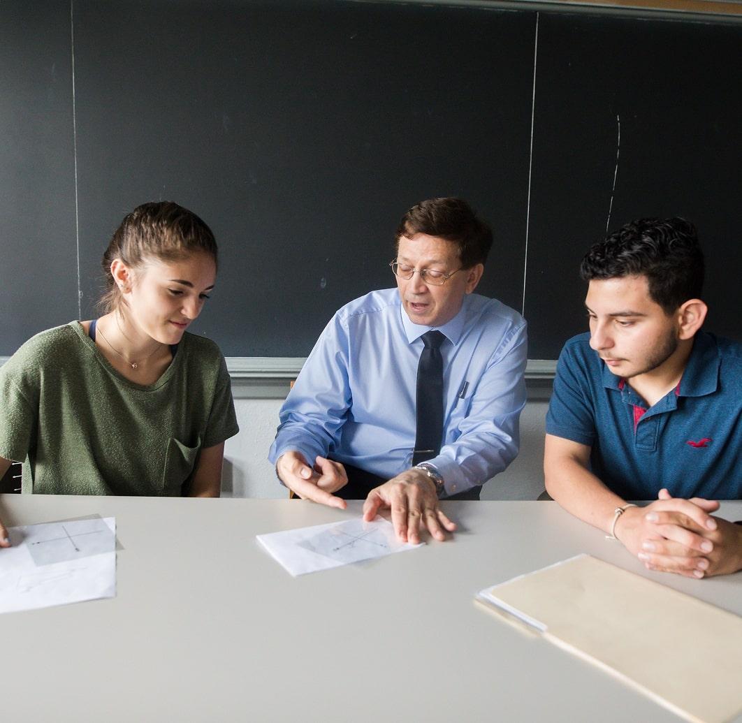 Students sitting at a conference table