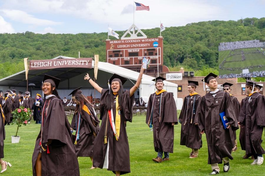 Graduates in line to receive their degrees