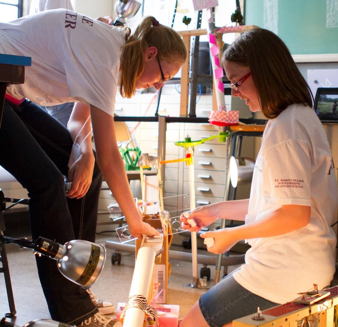 Professor and student working on a project