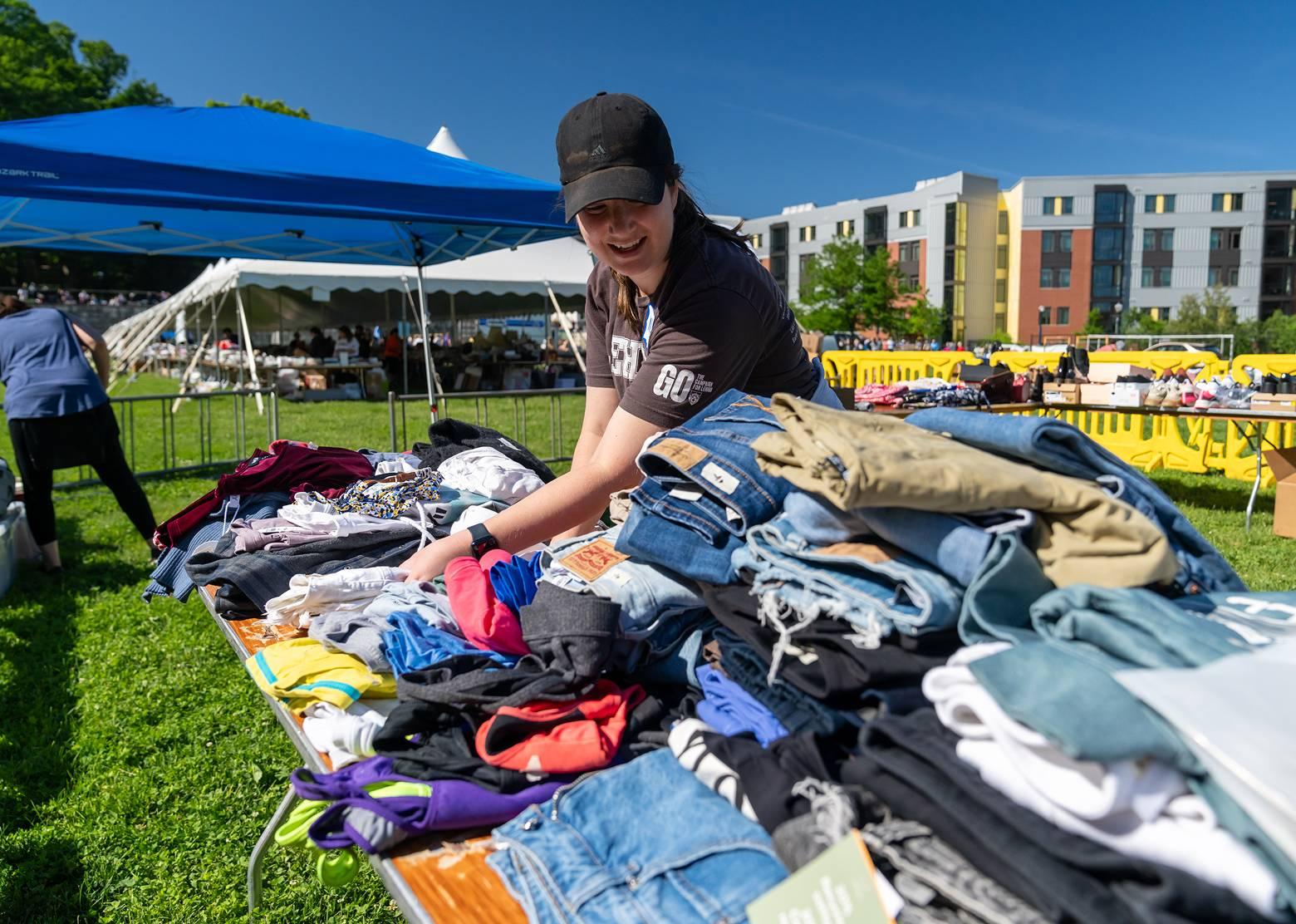 Vendor at a table at the South Side sale