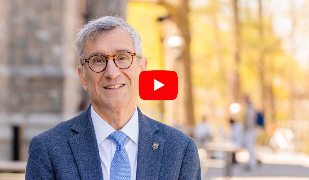 President Helble standing in front of Clayton University Center