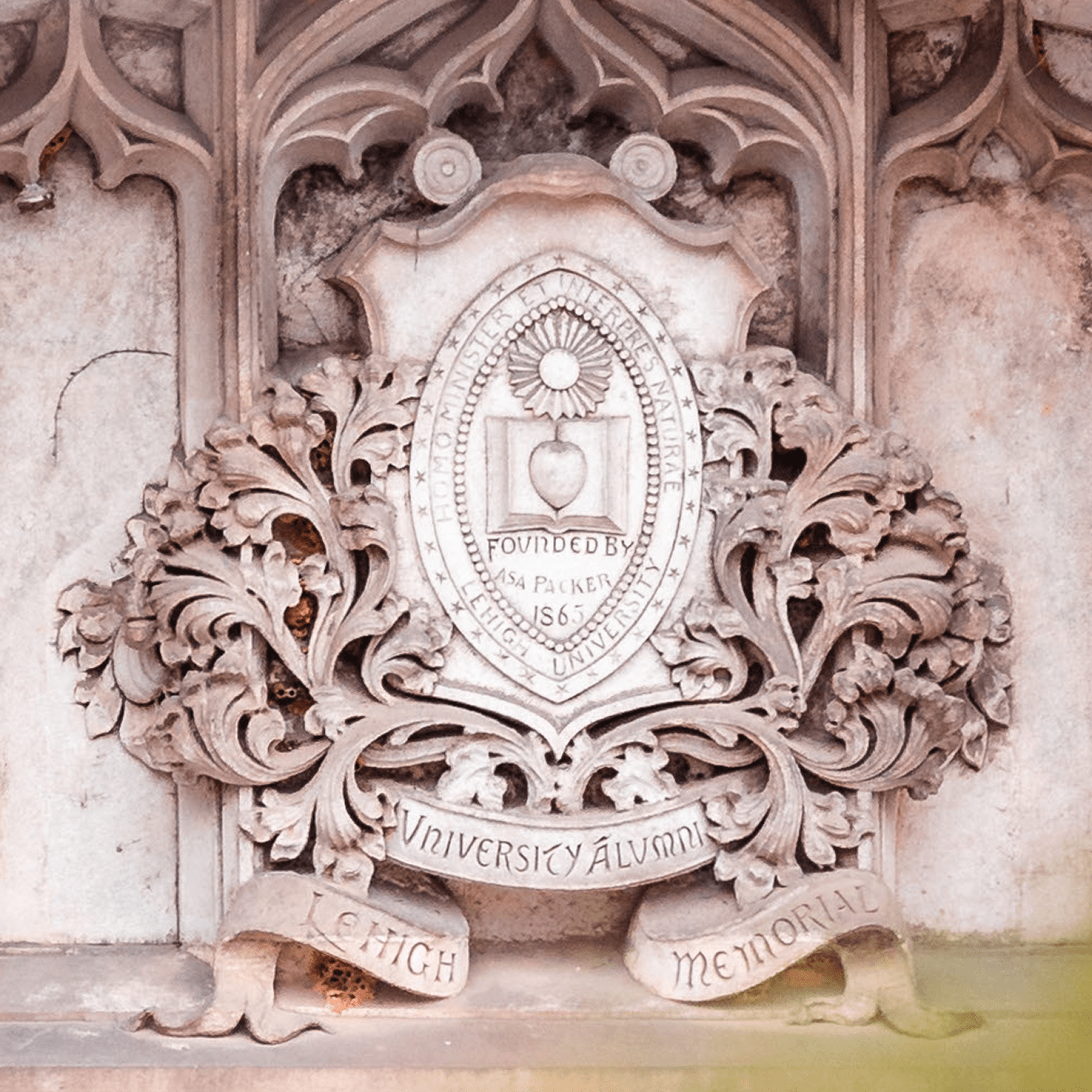 Embossed stone crest with "Lehigh University Alumni Memorial" banner.