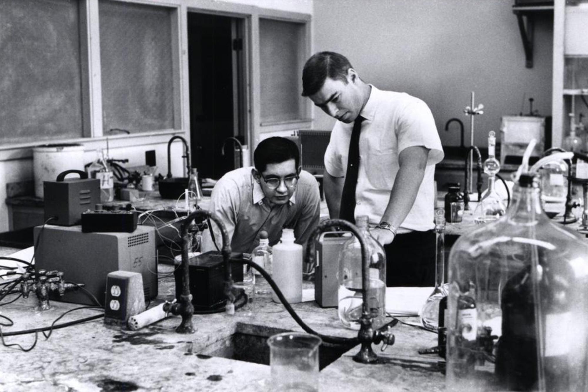 Two students working in a lab