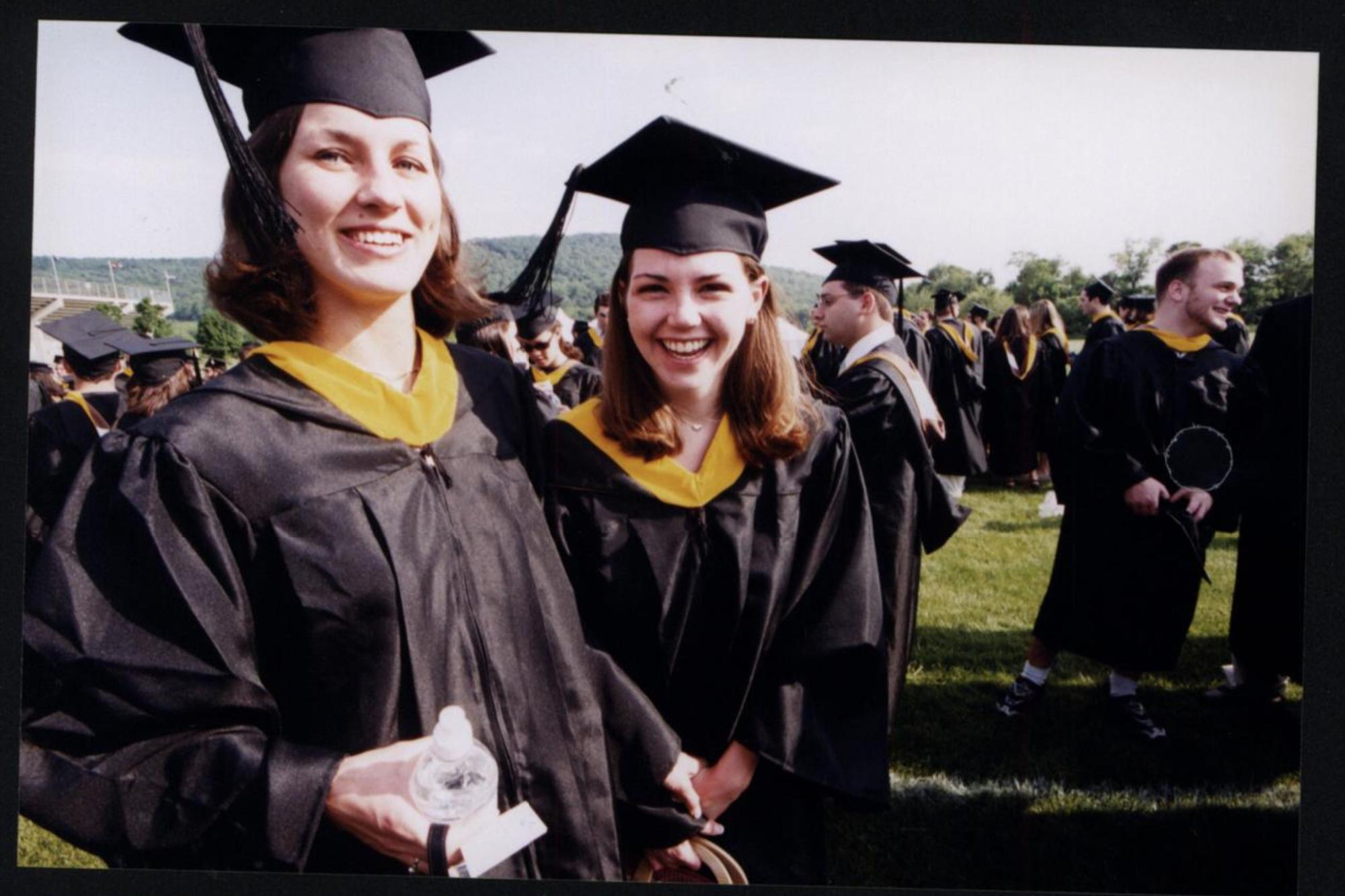Two female graduates at commencement