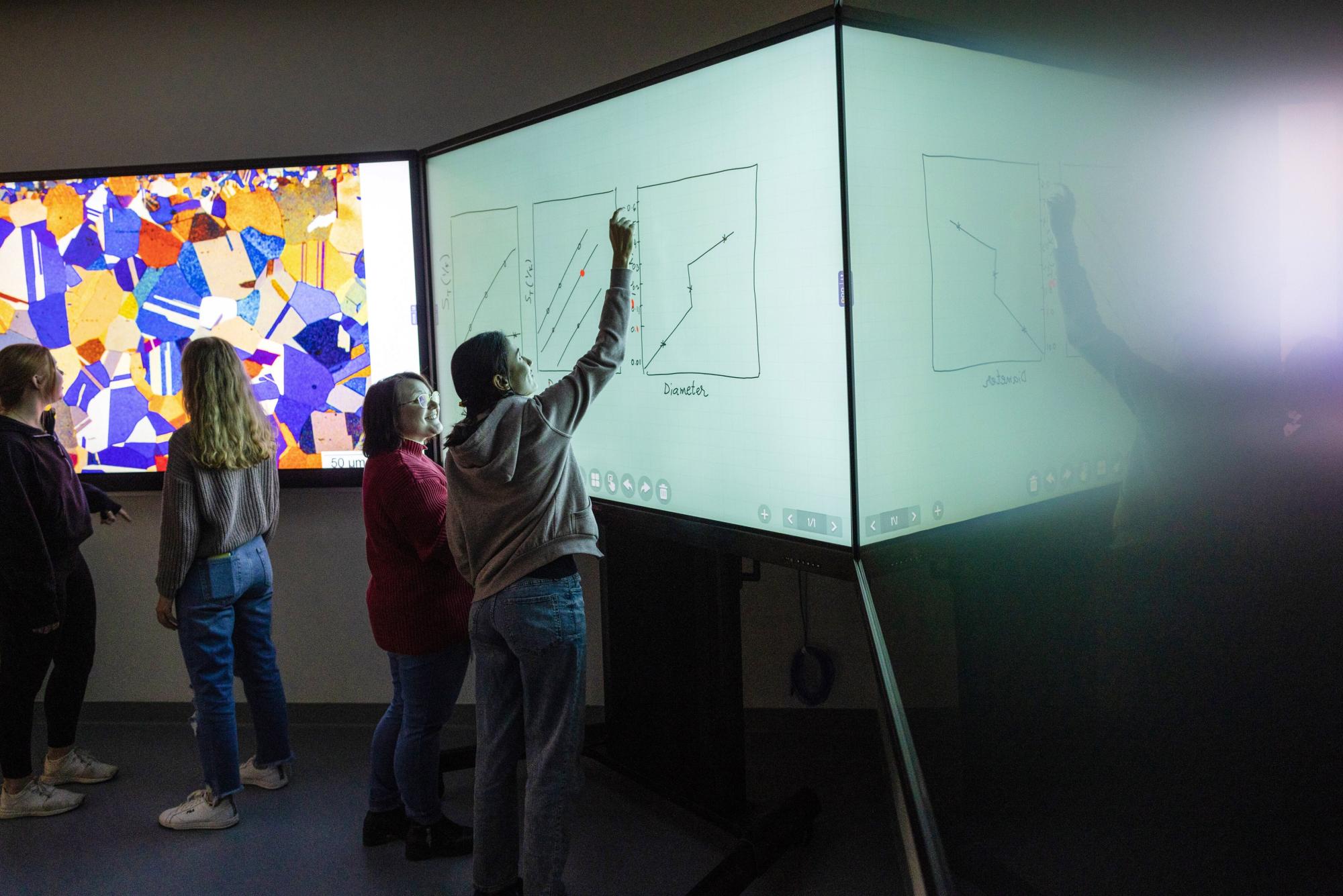 Students working on interactive displays