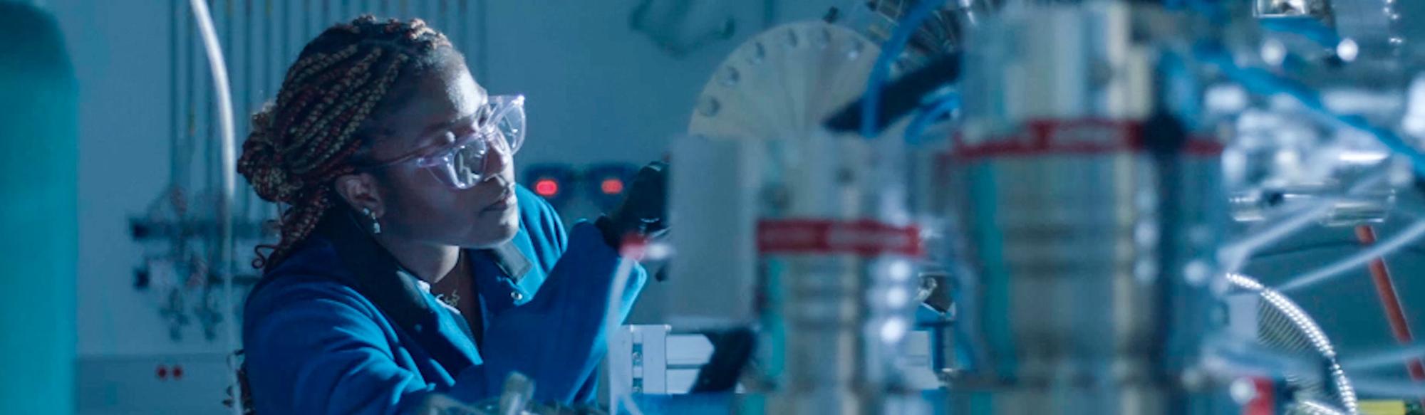 A professor performs an expermint in a lab
