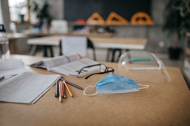 classroom supplies on a desk