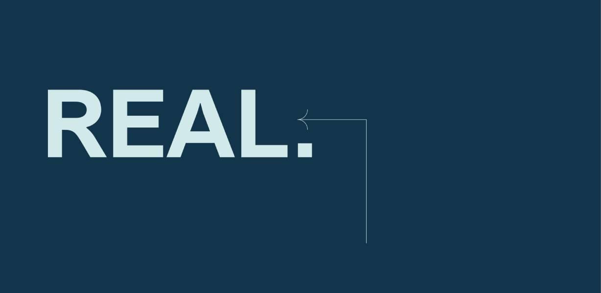 The world 'Real' with an arrow