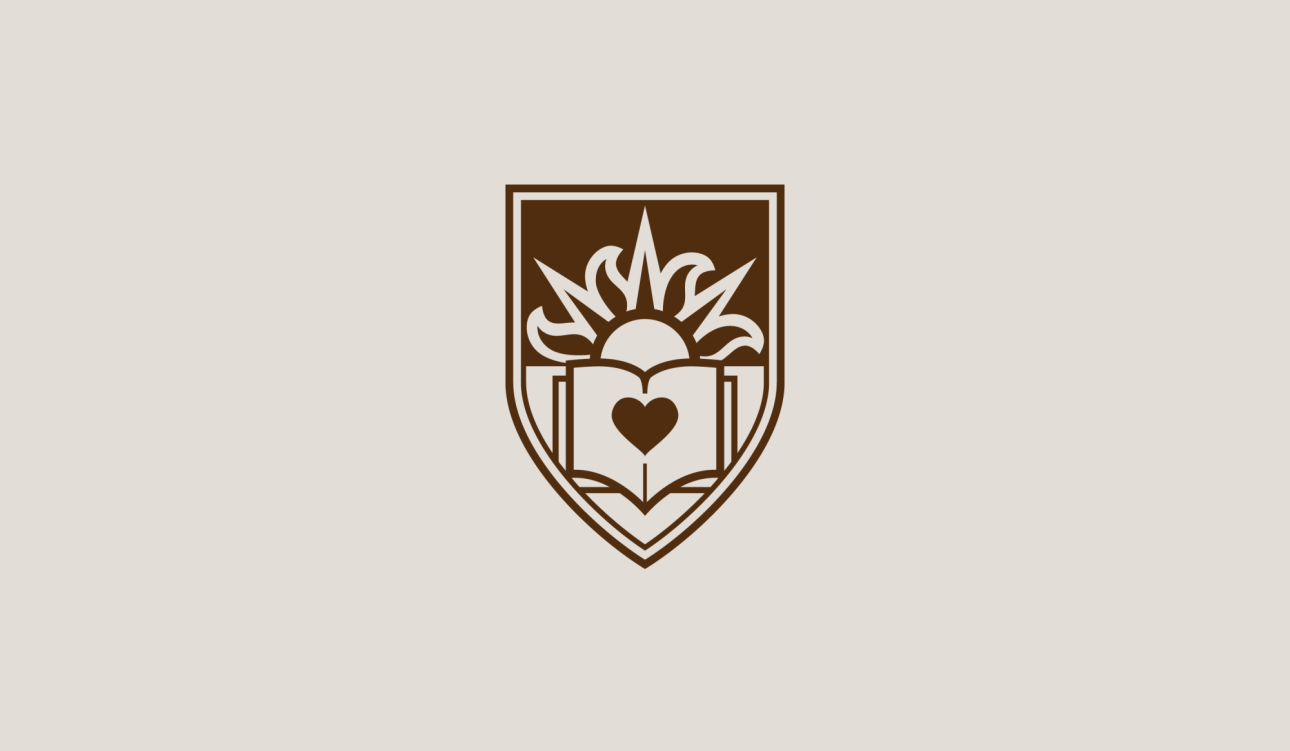 Brown emblem featuring a flame, an open book, and a heart symbol inside a shield.