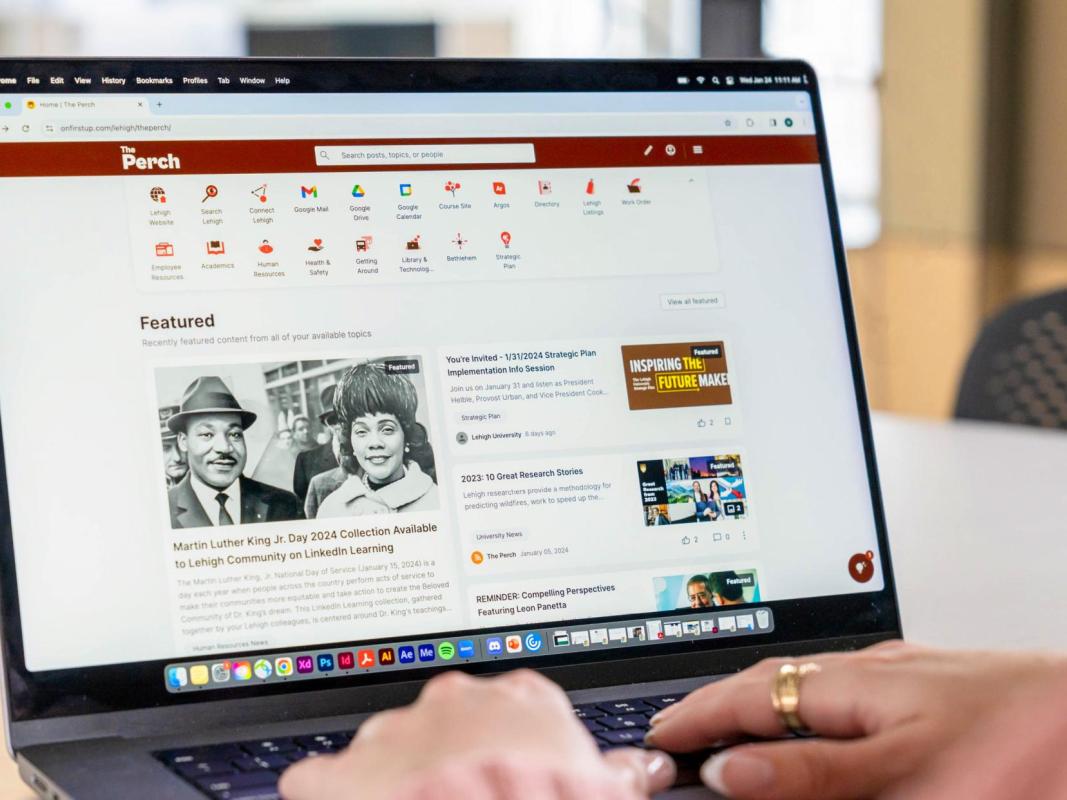 A laptop with The Perch on screen