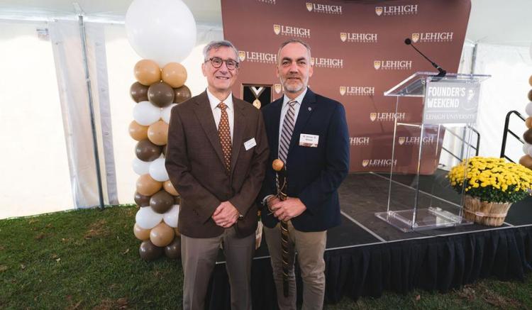 President Joseph J. Helble '82 and Murray H. Goodman Dean of Athletics Jeremy L. Gibson