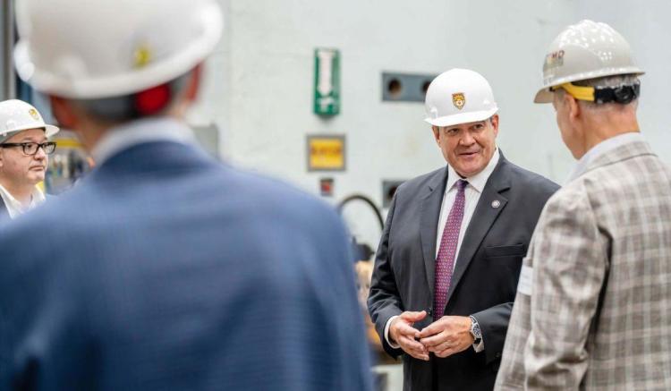 Men gathered in the hardhats in the Lehigh ATLSS center