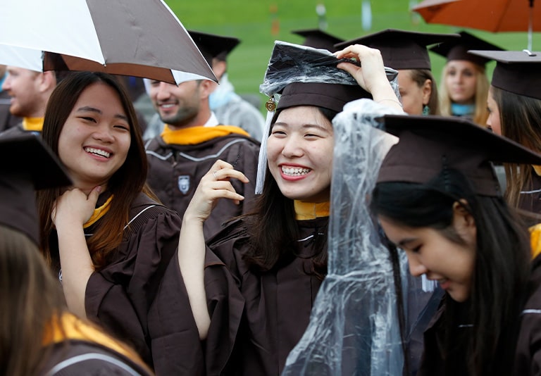 Graduates in the rain